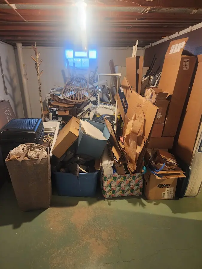 Roll-off dumpster container at job site for Yard Waste Dumpster Rental in Charles Town